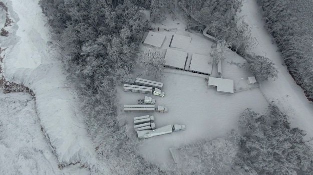 This handout picture released by the National Police of Guatemala shows an aerial view of the area around Volcano Fuego after an eruption in Guatemala on June 4, 2018.  Emergency workers resumed on Monday for Guatemalans missing after the eruption of the Fuego volcano on June 3, which belched out clouds of ash and flows of lava and left at least 25 people dead according to disaster agency spokesman. PHOTO: AFP