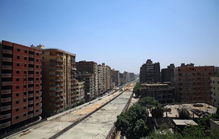 There is a highway in front of the Egyptian apartment...